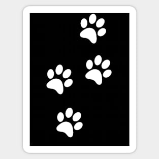 White Paw-prints on a black surface Sticker